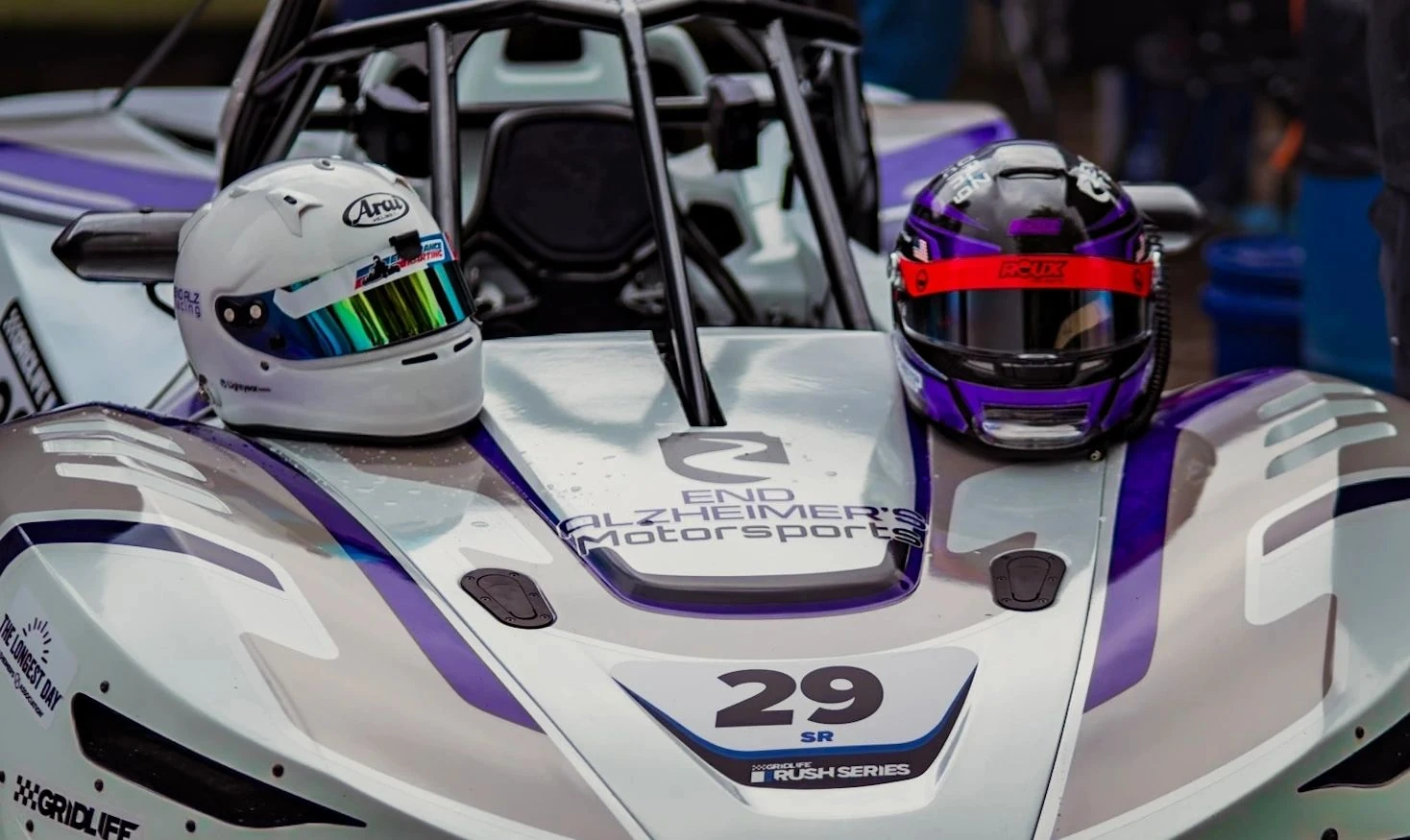 Two helmets on the number 29 End Alzheimer's Motorsports race car