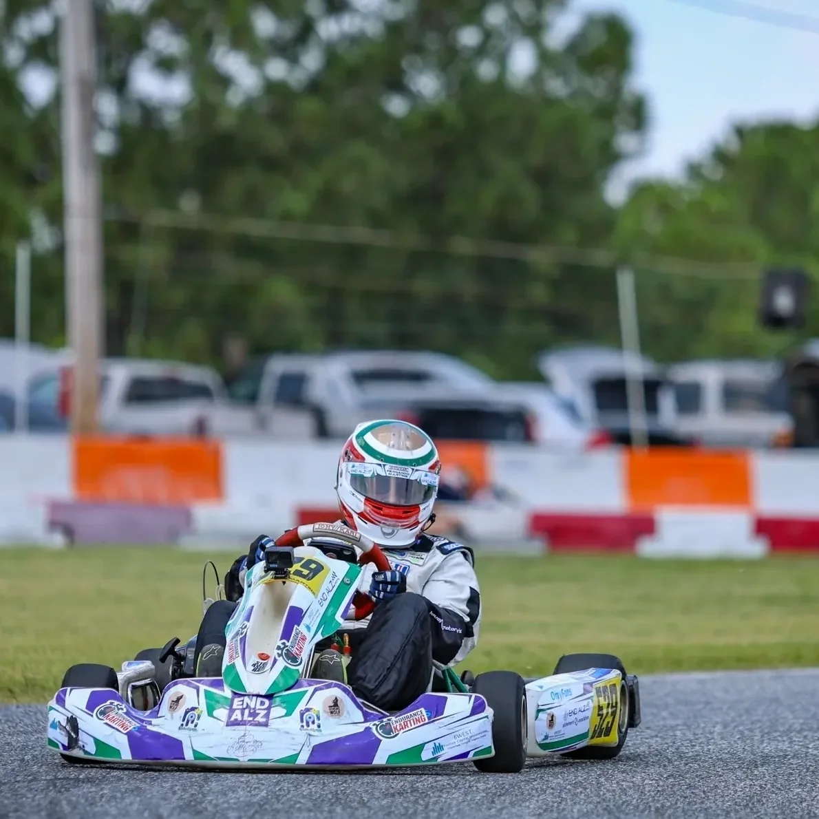 End Alzheimer's Motorsports driver racing a kart